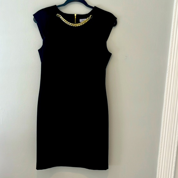 Calvin Klein with gold chain in the front. size M. - Picture 1 of 5